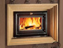 Jotul F 100 wood burning stove in fireplace thumbnail